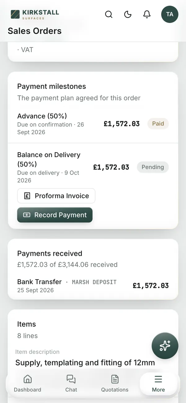 A sales order on a phone: the 50% deposit marked paid and the balance pending, due on the fitting date